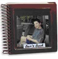 A 4 ¼ inch by 5 ½ inch spiral book with a photo of a boy and the words Ben’s Book on the cover.