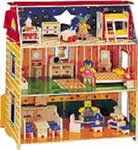 A three-story dollhouse with furniture and dolls set up inside the rooms.
